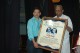Thumbs/tn_Mullapudi Venkata Ramana receiving Award from Chitten Raju Vanguri.jpg